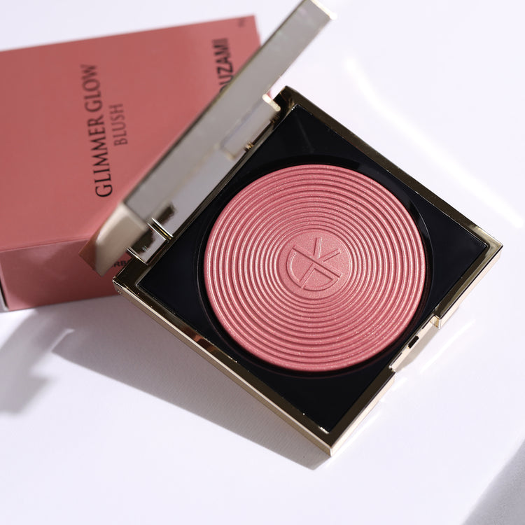 Glimmer Glow Blush - Bourbon Bronze: Highlighter and blush combo, Champagne-kissed glow, Lightweight, Buildable coverage, Radiant finish, Dewy finish, Long-lasting, Weightless texture, Exceptional grip, Flawless application, Day-to-night wear